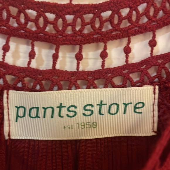 Short sleeve Gauze shirt with little fabric tassels around the bottom - Picture 2 of 7